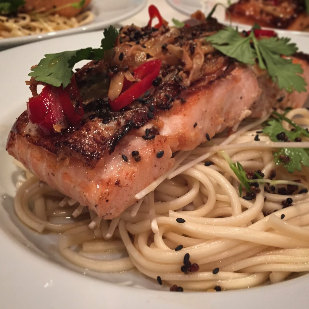 Crispy skinned salmon, with soba noodles, bok choy, chilli and lime